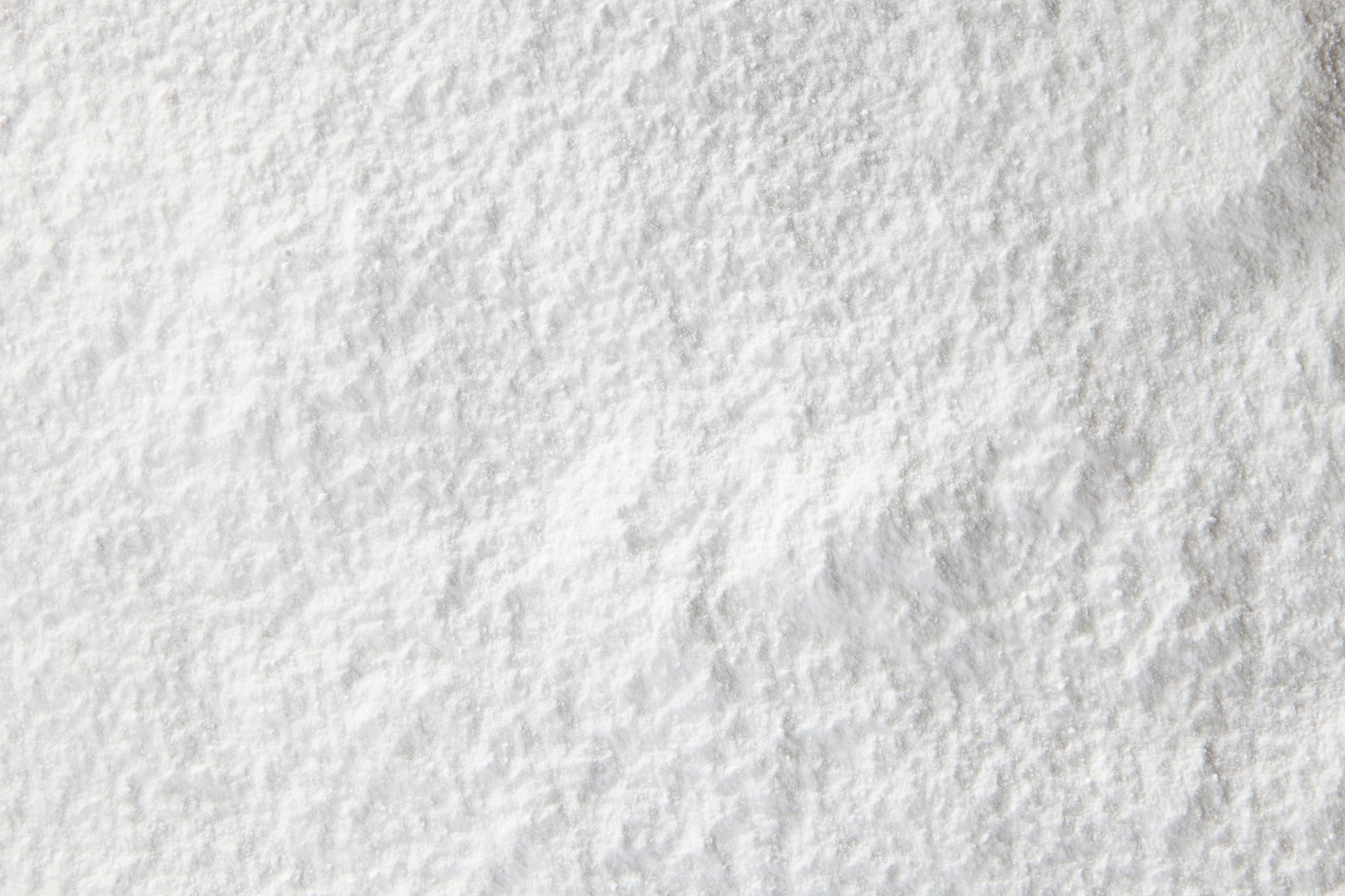 Weiße pulverförmige Substanz als Nahaufnahme